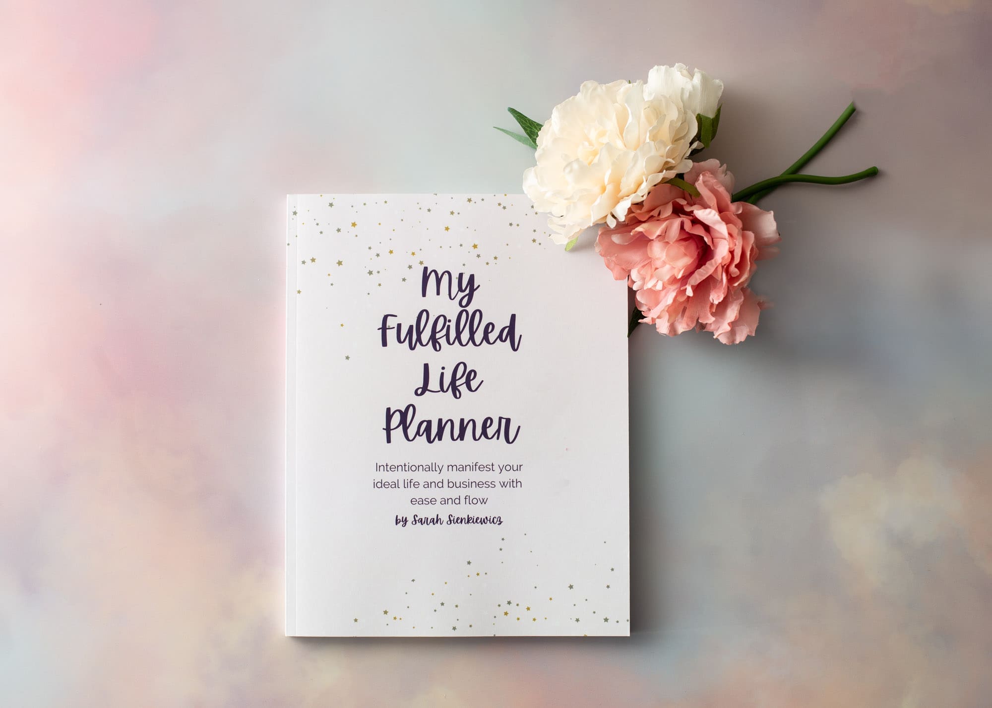 picture of the My Fulfilled life planner next to flowers